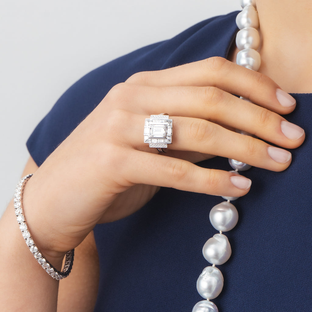 Baroque pearl necklace and baguette diamond ring