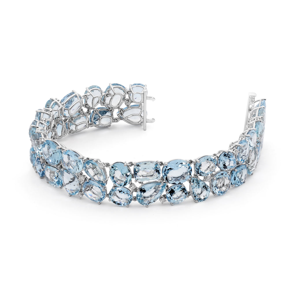18ct white gold, diamond and aquamarine bracelet by Matthew Ely Jewellery