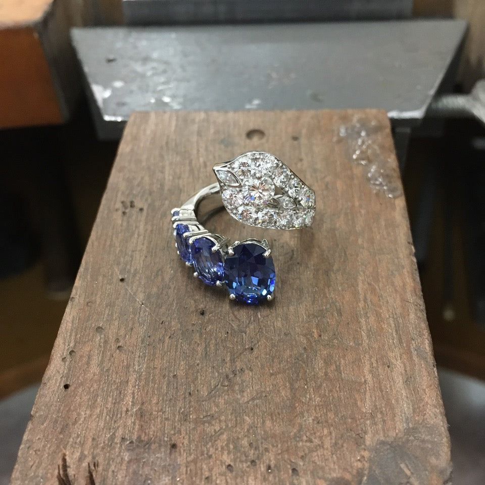 A custom made sapphire and diamond ring by Matthew Ely