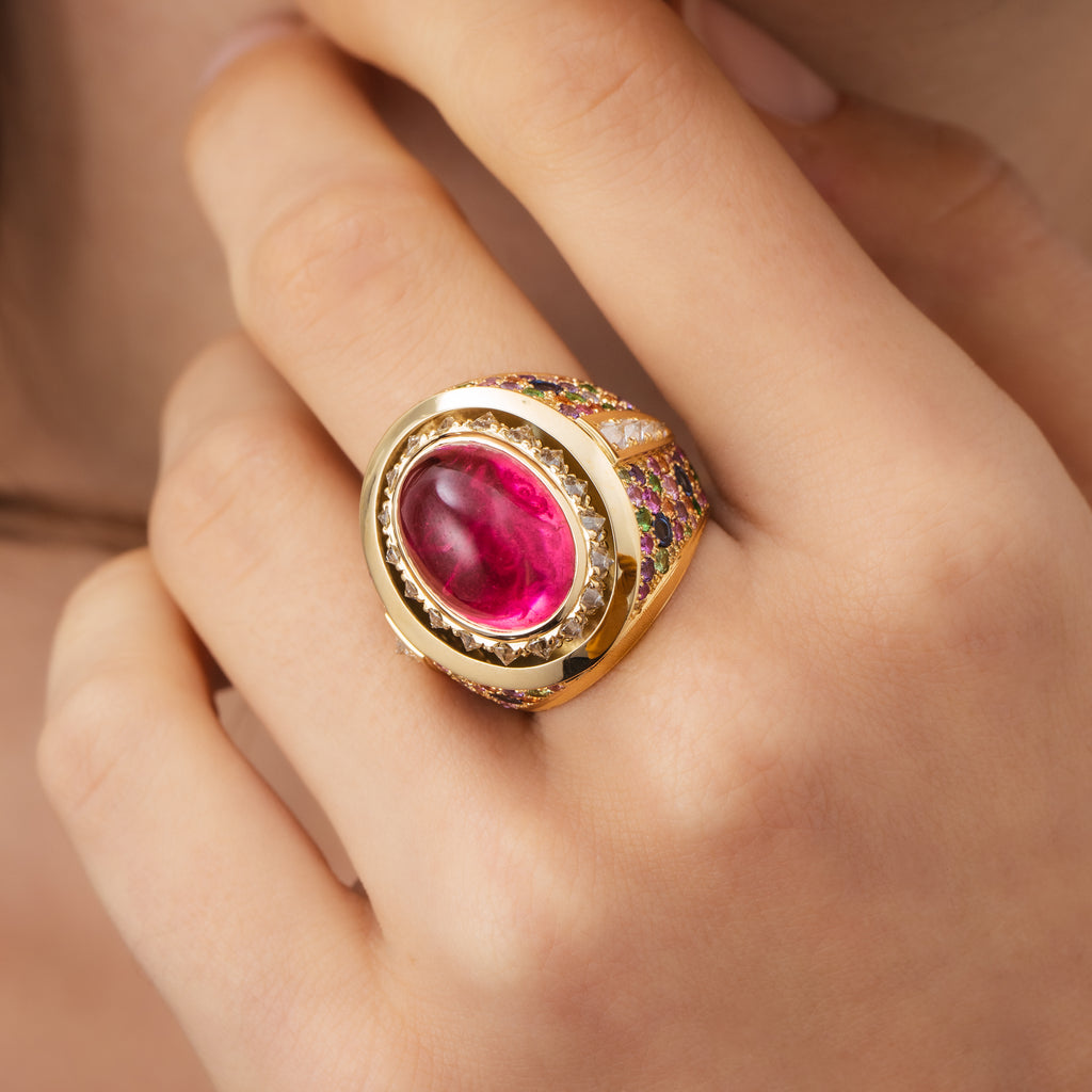 18ct yellow gold and tourmaline ring with hidden octopus engraving from Matthew Ely Jewellery