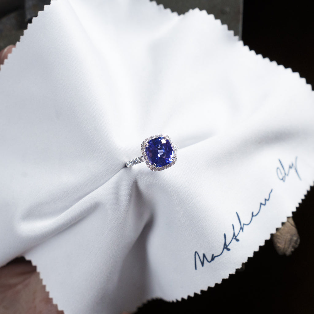 Tanzanite & Diamond Halo Ring From Matthew Ely Jewellery