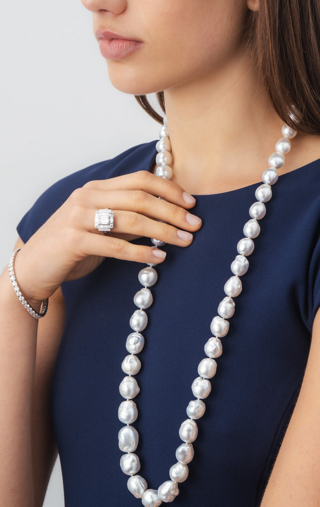 Baroque Pearl necklace and baguette diamond ring by Matthew Ely