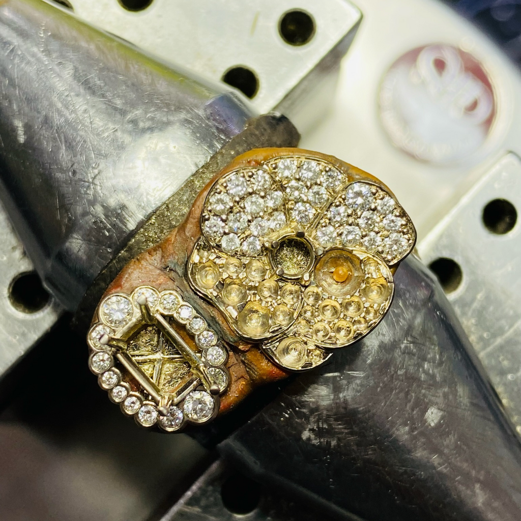 The making of a 18ct White Gold, Sapphire & Diamond Flower Ring
