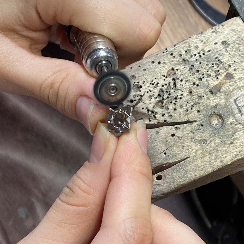 The making of an 18ct White Gold, Sapphire and Tanzanite Lapel Pin